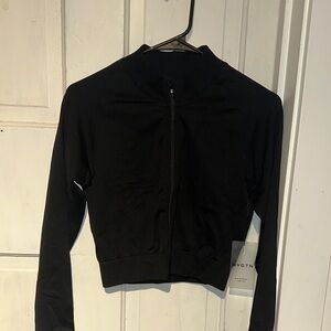NVGTN black devine seamless zip up. size small. NWT